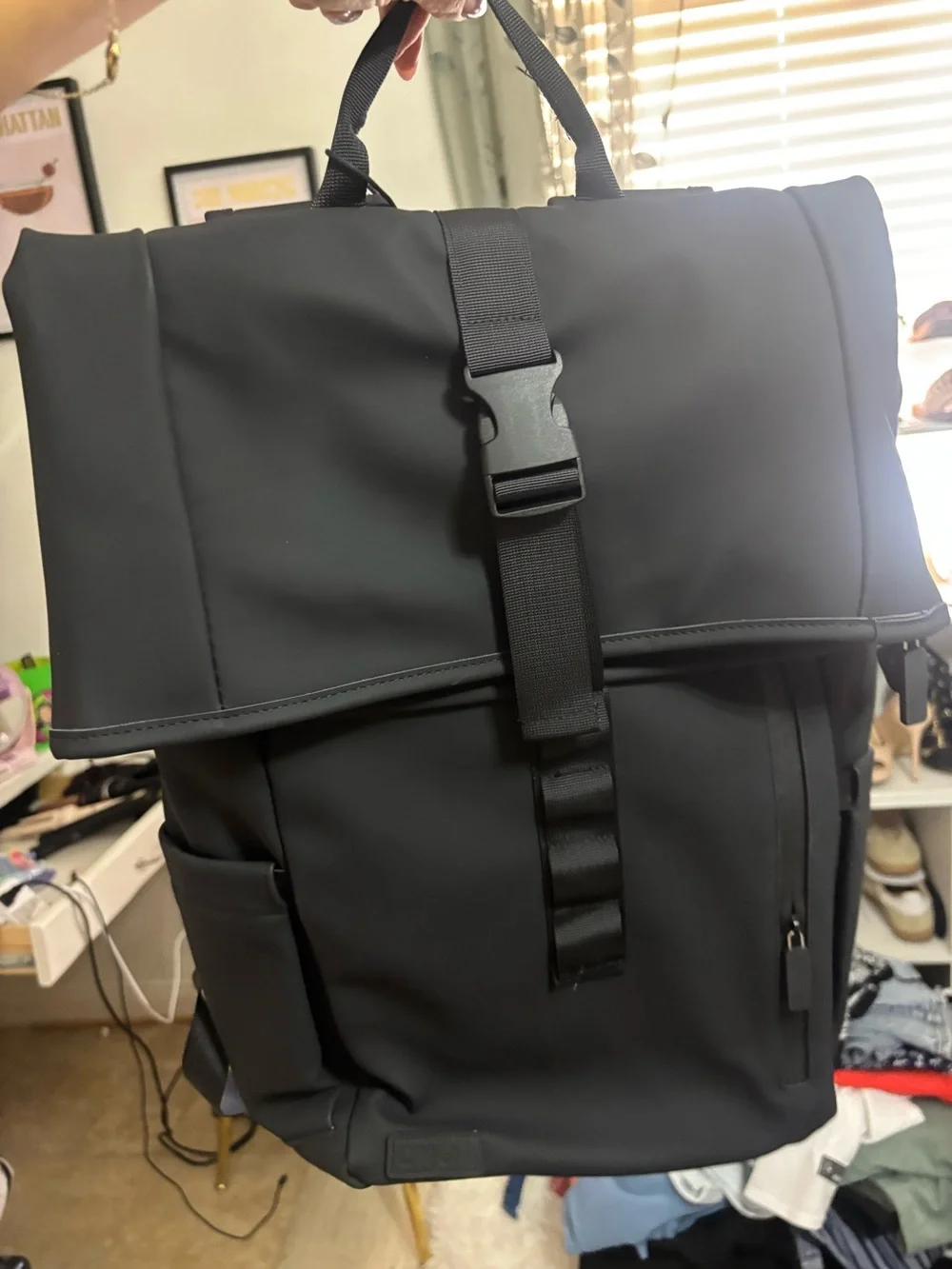 Men's Black Roll-Top Backpack with Buckle Closure
